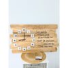 Horloge en bois avec citation inspirante.